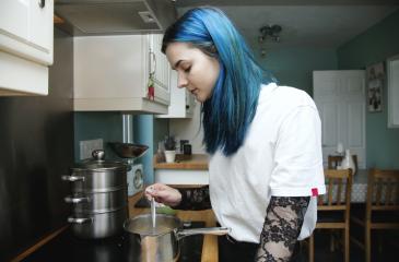 Teenager cooking